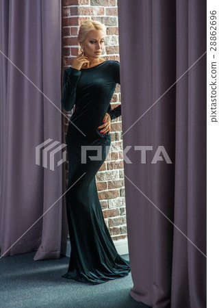 Beautiful woman in evening black dress Beautiful woman in evening black dress 28862696