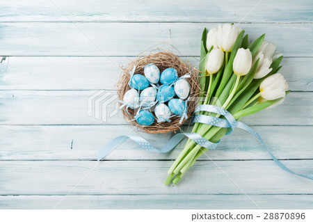 Easter eggs and white tulips 28870896