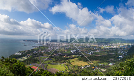 Ibusuki town skyline and blue sky from hill top 28872958
