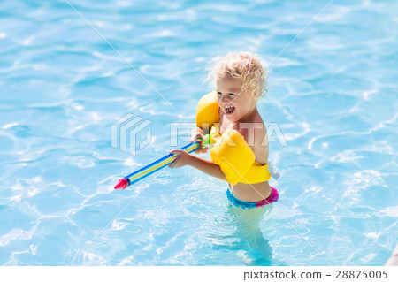Child playing in swimming pool Child playing in swimming pool 28875005