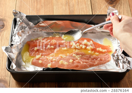 Baked salmon trout, cooking process. Baked salmon trout, cooking process. 28876164