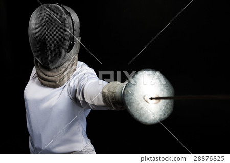 Portrait of fencer woman wearing white fencing 28876825