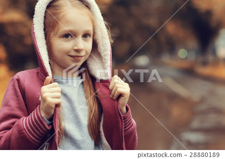 Autumn portrait of a girl 6 years old, in a jacket 28880189
