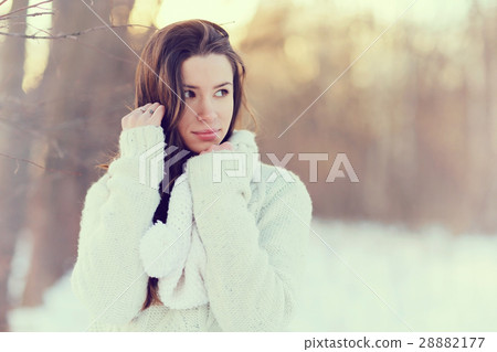 Spring portrait of a girl outside in a sweater 28882177