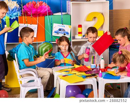 Children cutting paper in class. Development Children cutting paper in class. Development 28882552