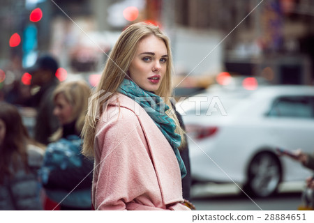 woman walking on the crowd  28884651