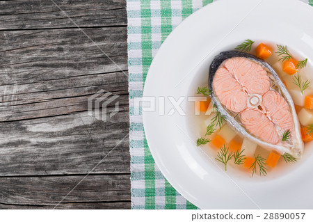 salmon soup with vegetables and dil, top view salmon soup with vegetables and dil, top view 28890057
