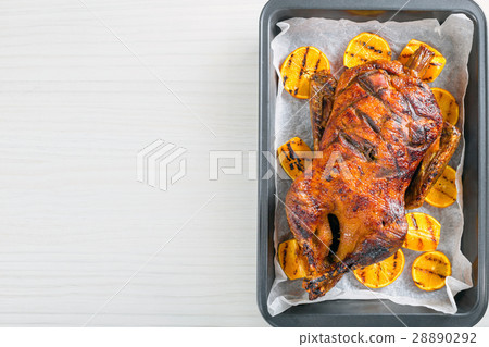 Roasted Whole Duck in honey mustard soy glaze 28890292