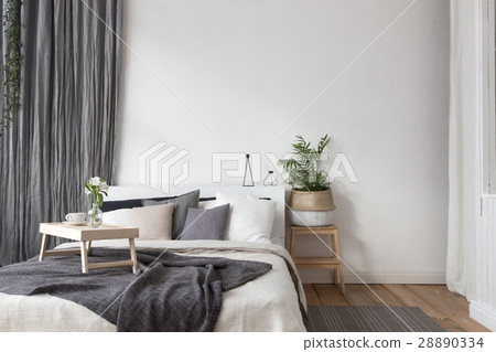 Interior of white and gray cozy bedroom Interior of white and gray cozy bedroom 28890334