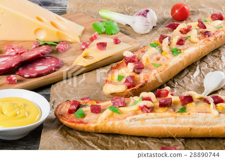 sandwich with smoked sausage, corn and cheese 28890744