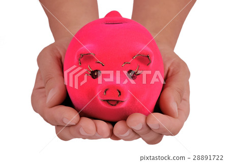 Piggy bank in the palm of hands Piggy bank in the palm of hands 28891722