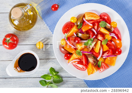 tomato salad with mint leaves and olive oil tomato salad with mint leaves and olive oil 28896942