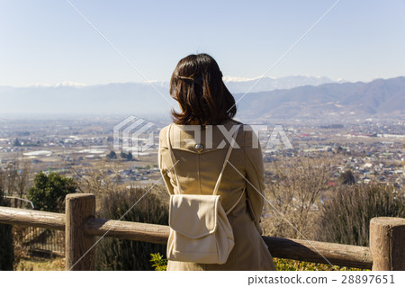 A woman watching Yatsugatake 28897651