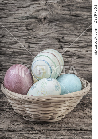 Colorful easter eggs in a basket 28897652