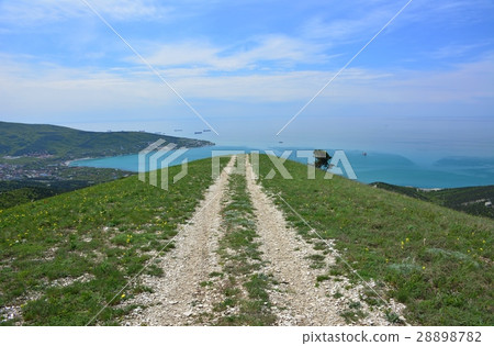 Mountain road to the sea 28898782