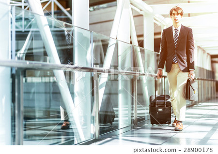 A man who walks a passage with a carry-back A man who walks a passage with a carry-back 28900178