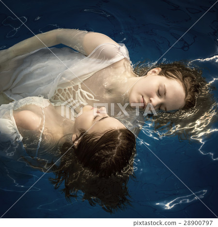 Portrait of two young girls in water 28900797