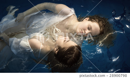 Portrait of two young girls in water 28900798