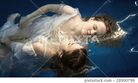 Portrait of two young girls in water 28900799
