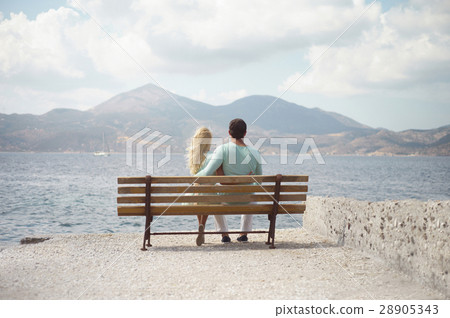 Romantic couple on a seashore Romantic couple on a seashore 28905343