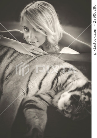 Woman and tiger Woman and tiger 28906296