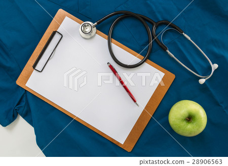 Clipboard with stethoscope on doctor's shirt 28906563