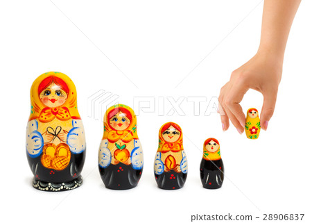 Hand and russian toy matrioska Hand and russian toy matrioska 28906837