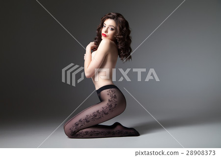 Attractive young woman wearing tights Attractive young woman wearing tights 28908373