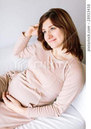 the beautiful thoughtful pregnant brunette woman 28913438