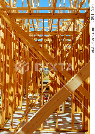 Wood framing new house under construction Wood framing new house under construction 28913536