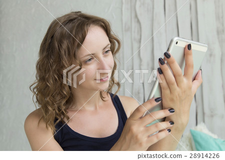 Happy young woman with tablet pc Happy young woman with tablet pc 28914226