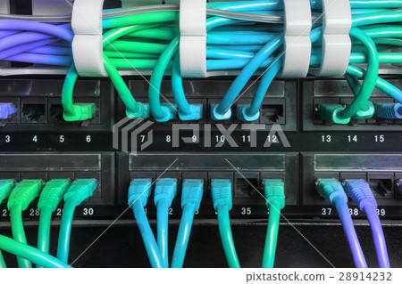 Server rack with blue internet patch cord cables 28914232