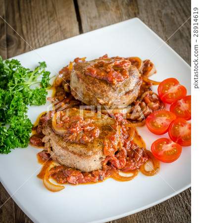 图库照片 angus beef steaks with roasted tomato sauce