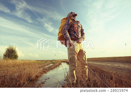 man traveler tourist landscape at sunset wildlife man traveler tourist landscape at sunset wildlife 28915974