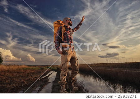 man traveler with a backpack wildlife adventure 28918271