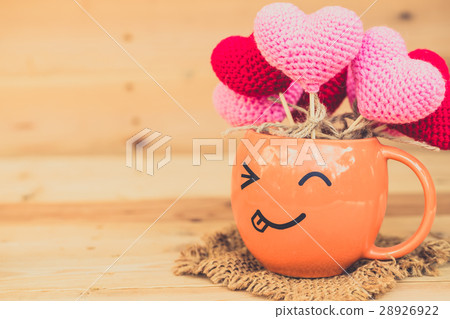 smile coffee cup with heart on wood background. smile coffee cup with heart on wood background. 28926922