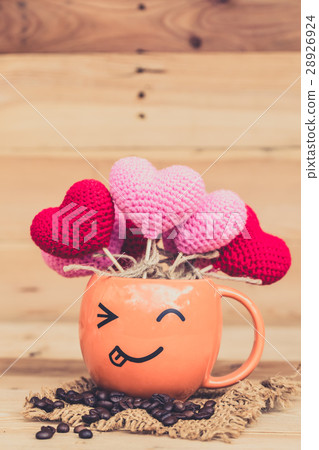 smile coffee cup with heart on wood background. smile coffee cup with heart on wood background. 28926924