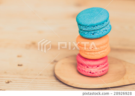 macaron cakes or macaroon on wood background. 28926928