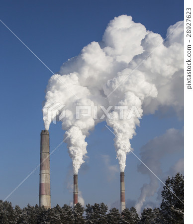Smoking chimney of industrial buildings complex. Smoking chimney of industrial buildings complex. 28927623