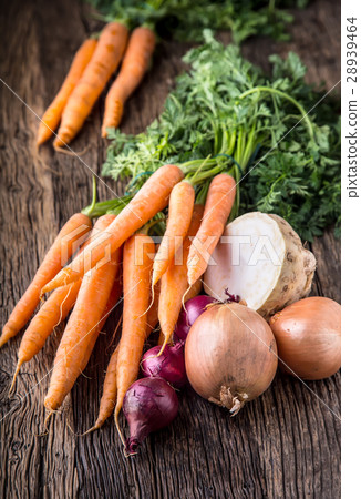 Carrot celery onion. Fresh vegetable on old table. Carrot celery onion. Fresh vegetable on old table. 28939464