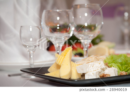 glasses with a cheese plate glasses with a cheese plate 28940019