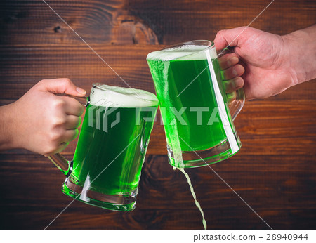 St Patrick's Day two mug on hands green beer St Patrick's Day two mug on hands green beer 28940944
