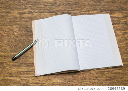 Paper and pencils on the wooden table. close-up. Paper and pencils on the wooden table. close-up. 28942389