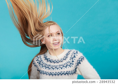 Crazy blonde woman with windblown blonde hair 28943532