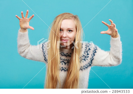 Young blonde woman making scary faces 28943533
