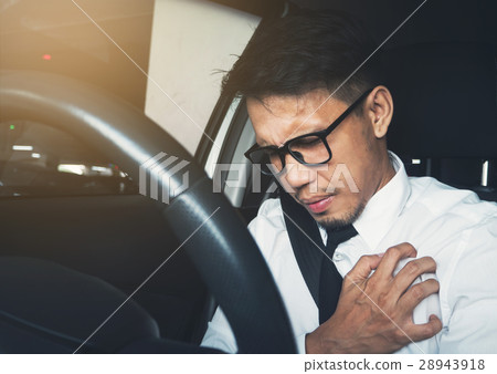 Asian businessman having heart attack Asian businessman having heart attack 28943918