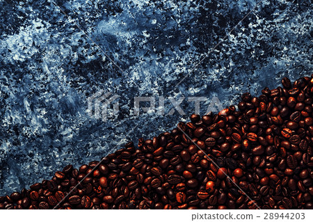 Coffee beans on a dark background of a concrete 28944203
