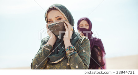 Thirsty women walking in a desert. Lost during the 28944721