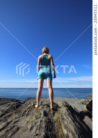 Woman look at sea 28945511