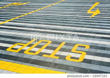 Yellow road marking on pave 28947101